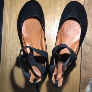 Black leather flats